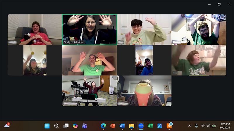 computer screen showing digital frames containing people participating in an activity